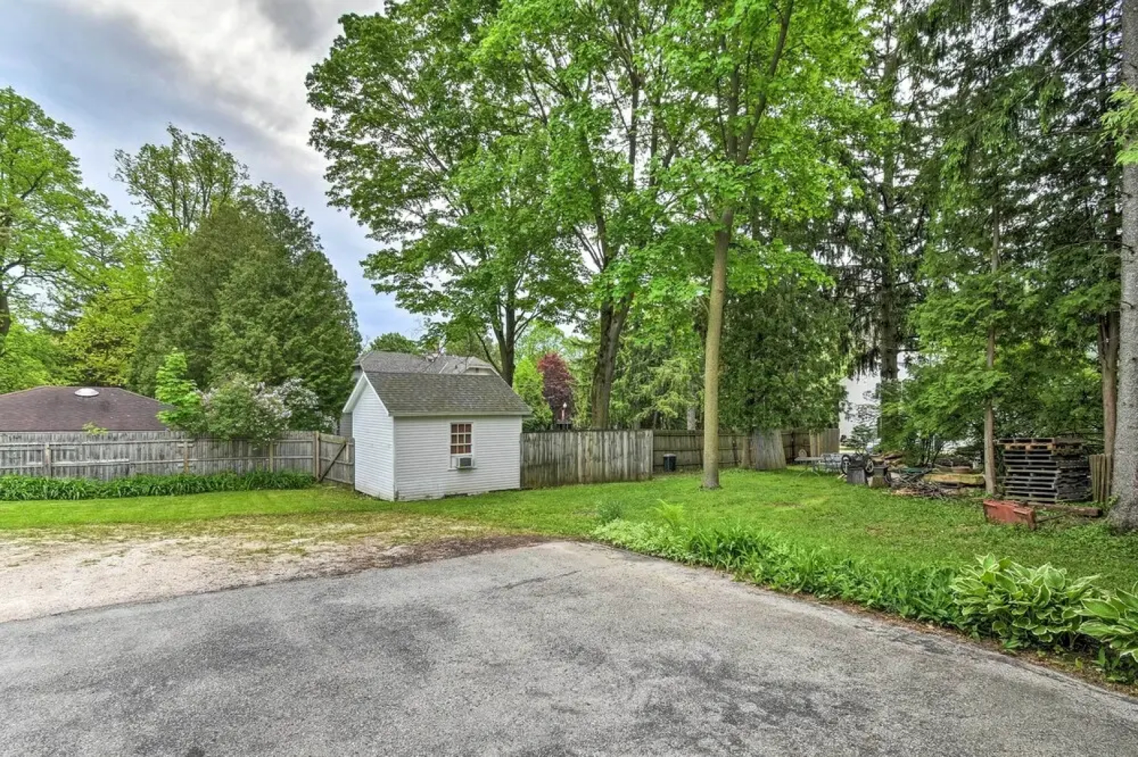 Walkable Lake Elkhart Apt: Dine, Shop, Swim!