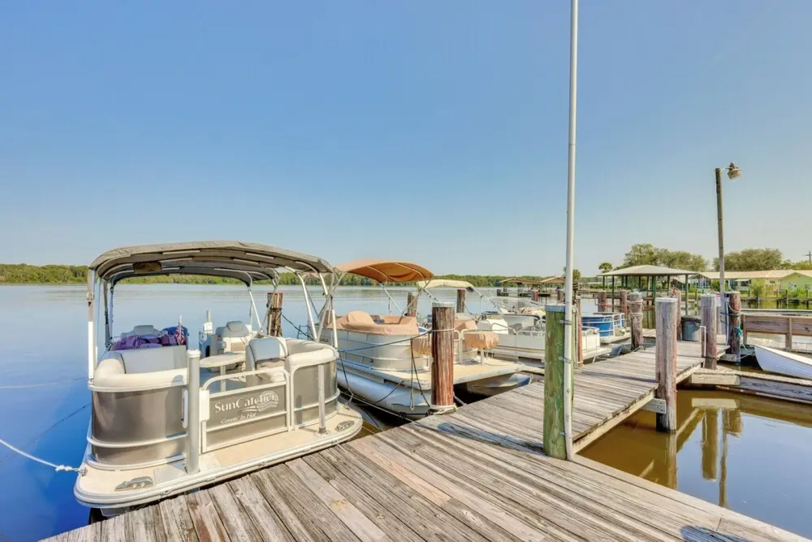 Riverfront Weleka Condo w/ Dock & Pool Access