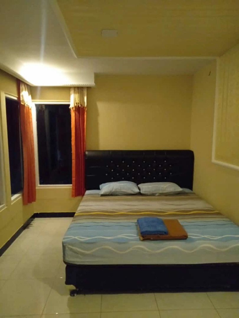 Penginapan BoB Home by ZUZU