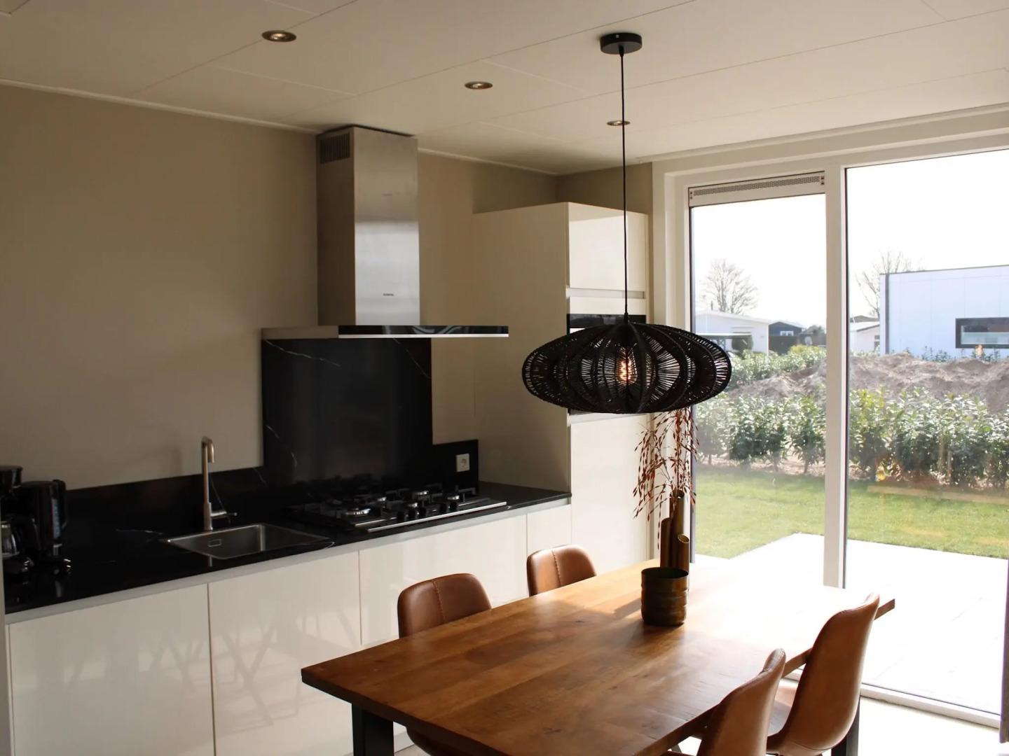 Wellness chalet with a sauna, in a holiday park directly on a recreational lake