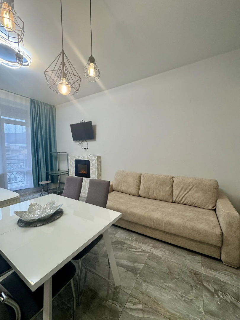 Квартира Просторная студия с террасой напротив отеля Мариотт