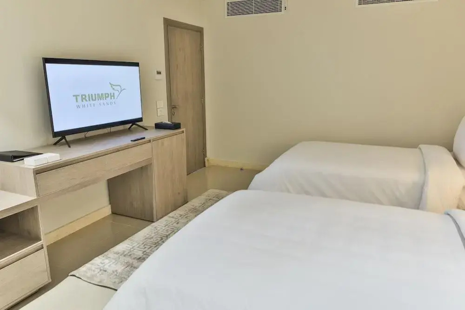 Отель Triumph White Sands