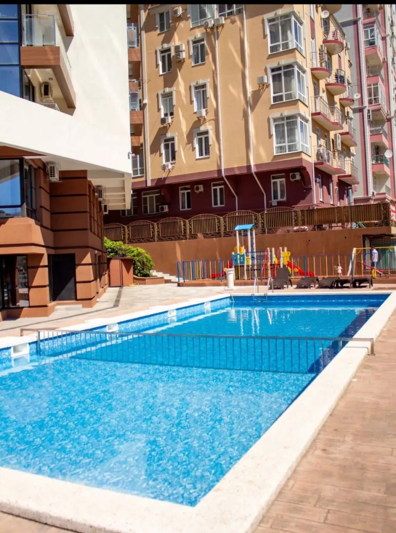 Квартира в  доме с бассейном рядом с морем