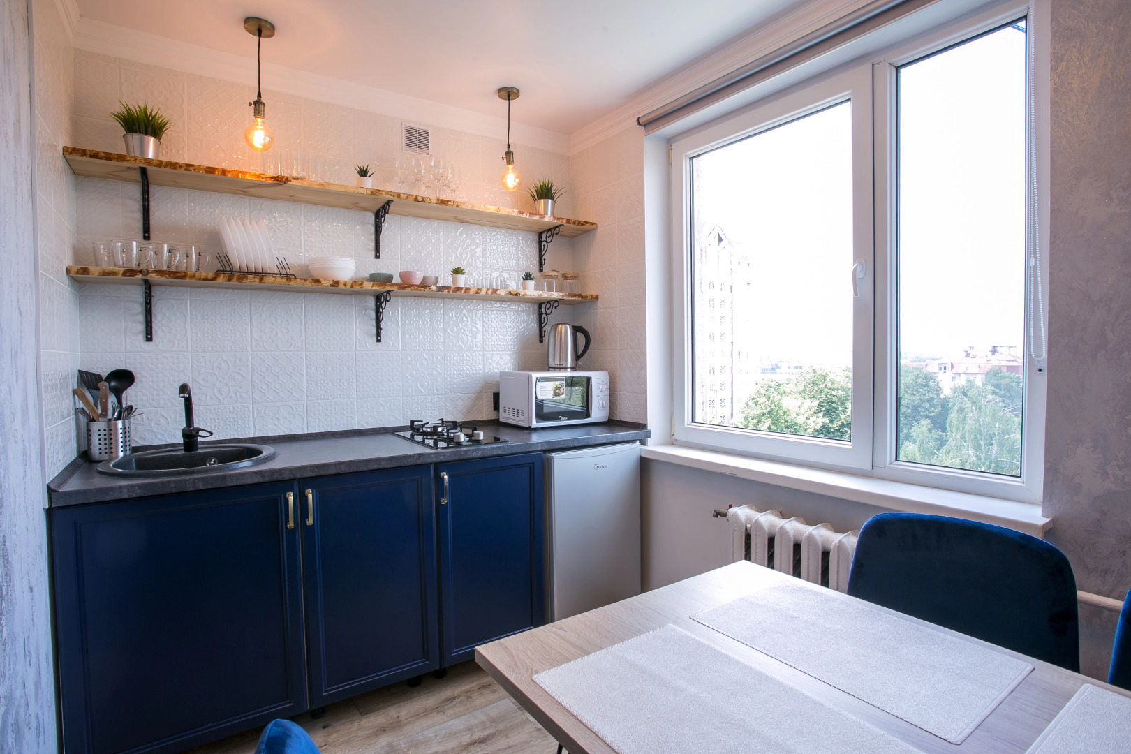 Апартаменты с видом на закат и крыши