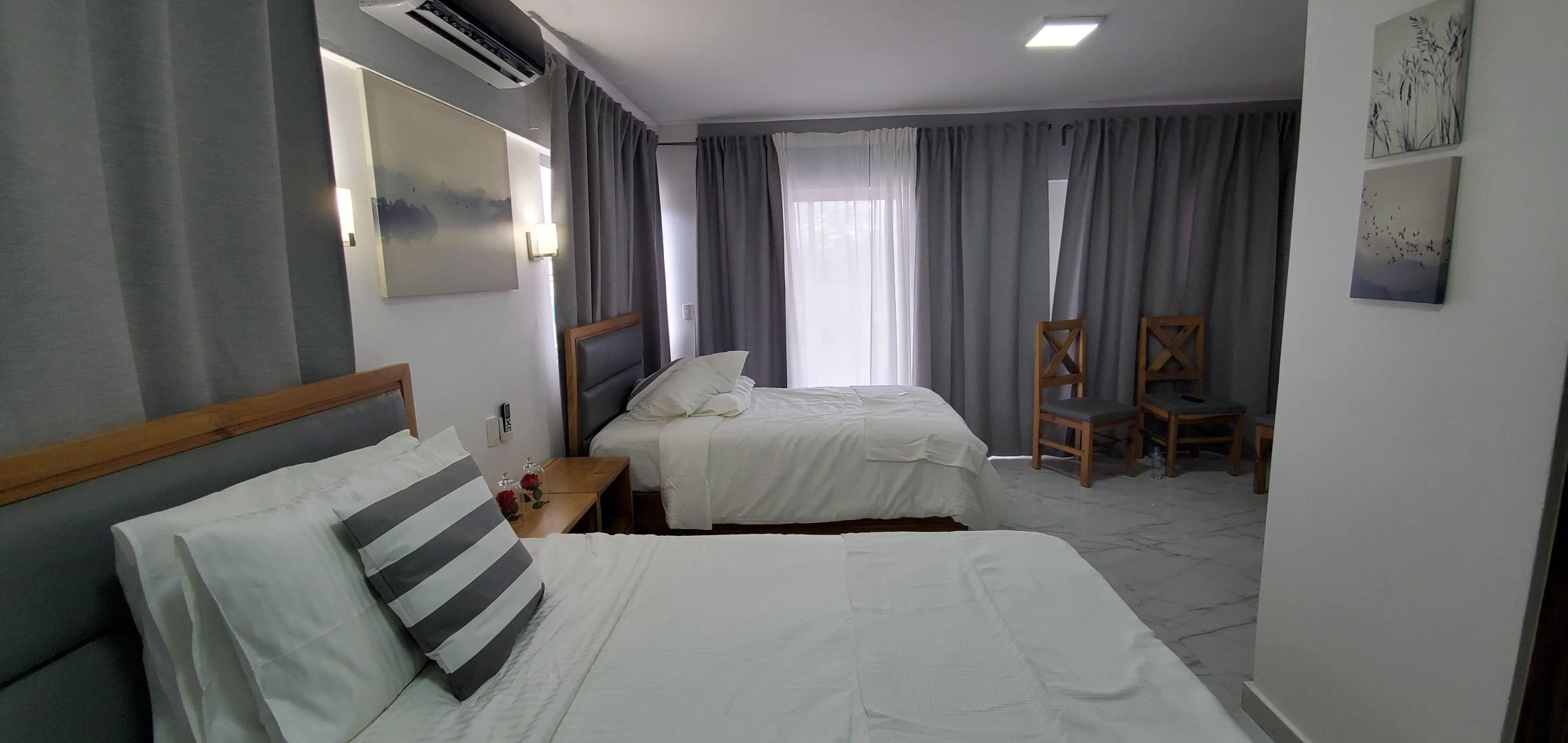 Отель Boca Grande Suites