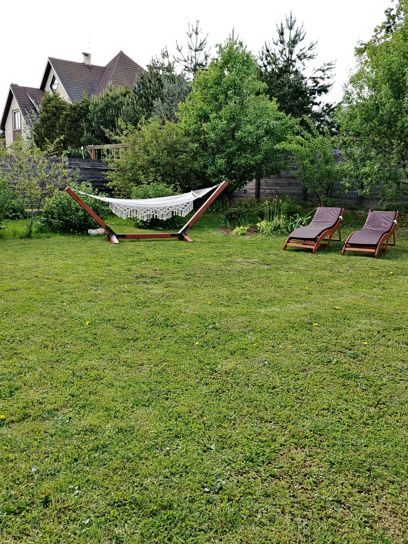 Частный дом Уютный с купелью, сауной и камином Лаундж с гамаком и лежаками