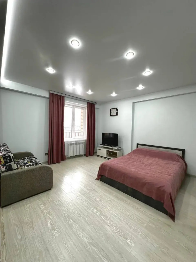 Квартира Уютная студия рядом с ЖД вокзалом