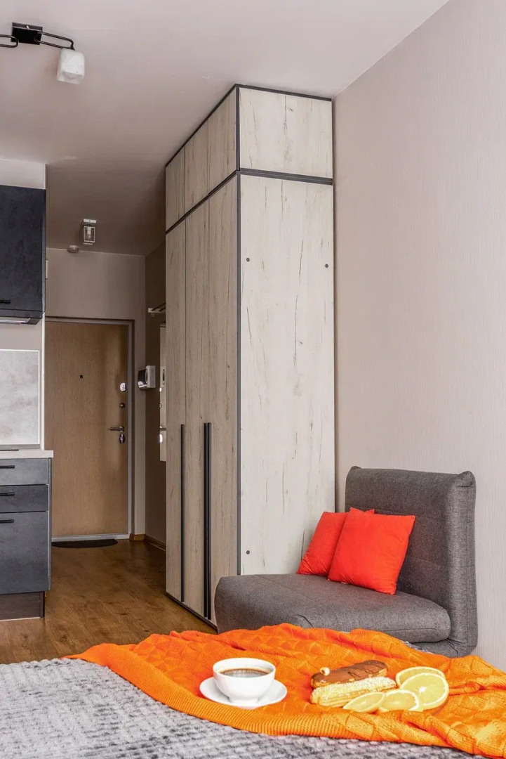 Апартаменты Уютная студия у метро Парнас