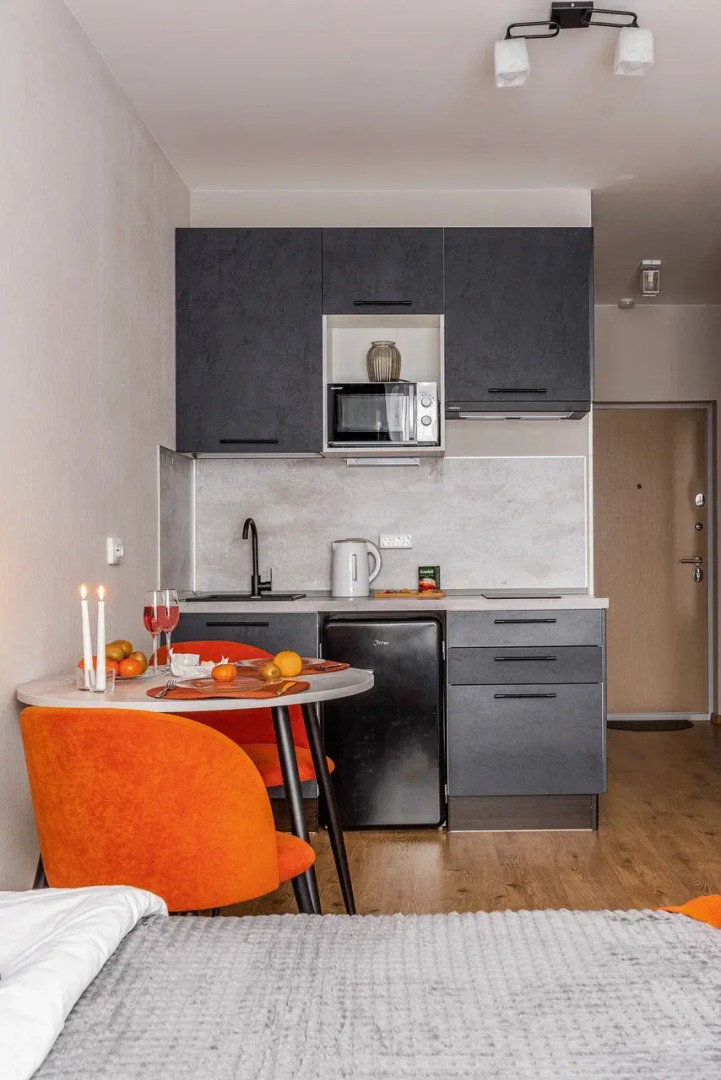 Апартаменты Уютная студия у метро Парнас