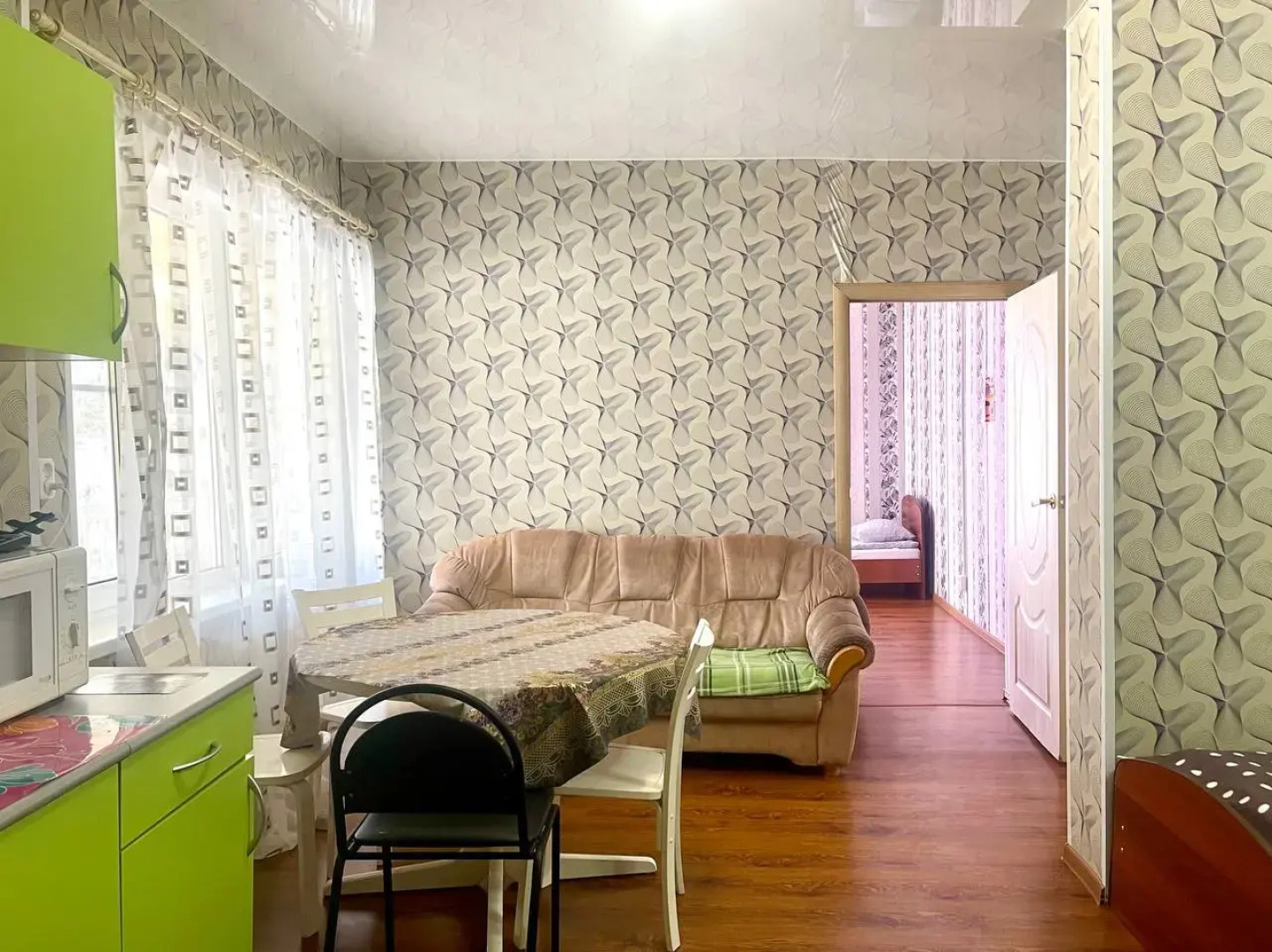 Апартаменты С кухней гостиной и отдельной спальней