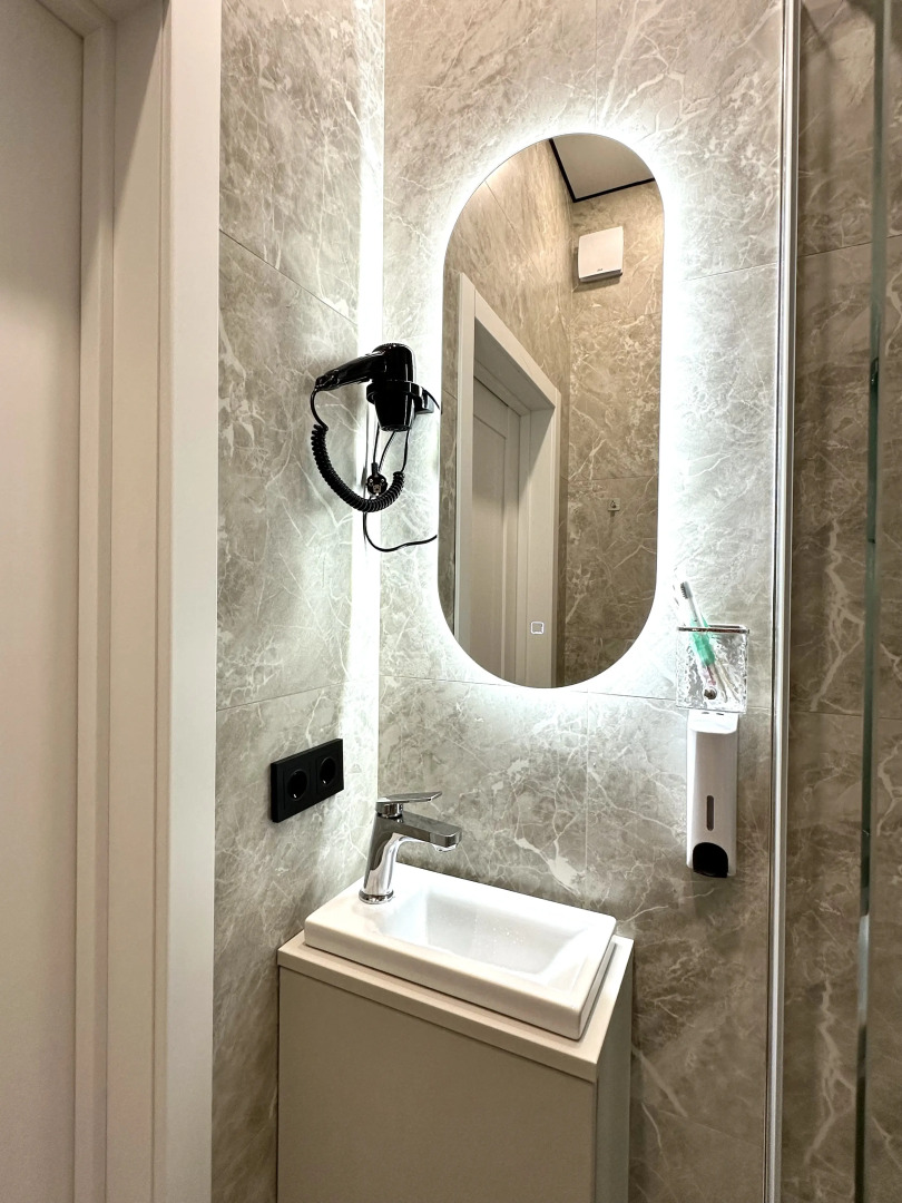 Апартаменты Уютная студия рядом с Аквапарком и Чашей