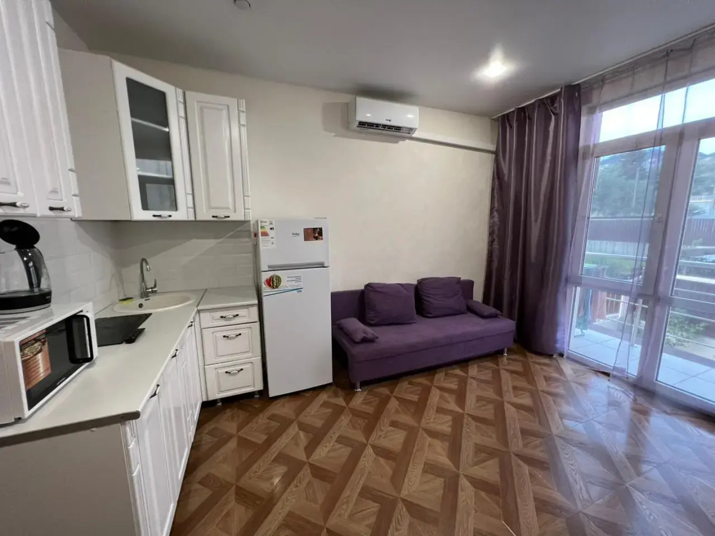 Апартаменты Уютная Cтудия на Веселой от HomeHotelSochi 9