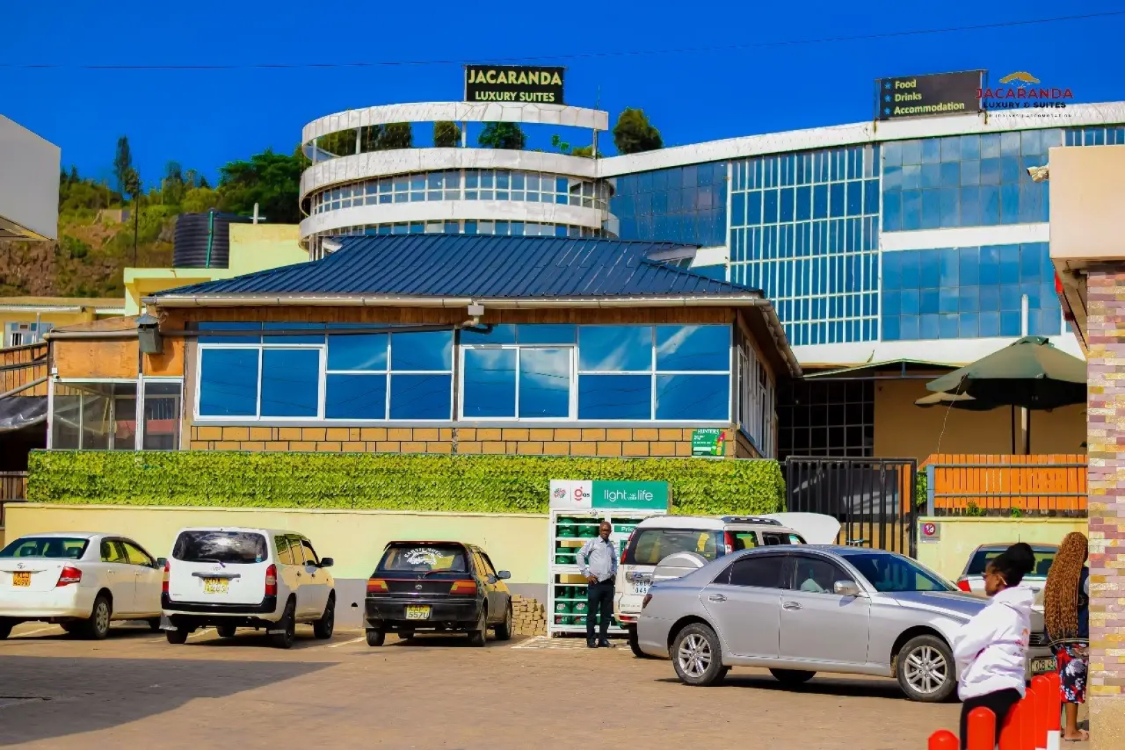 Отель Jacaranda Luxury Suites