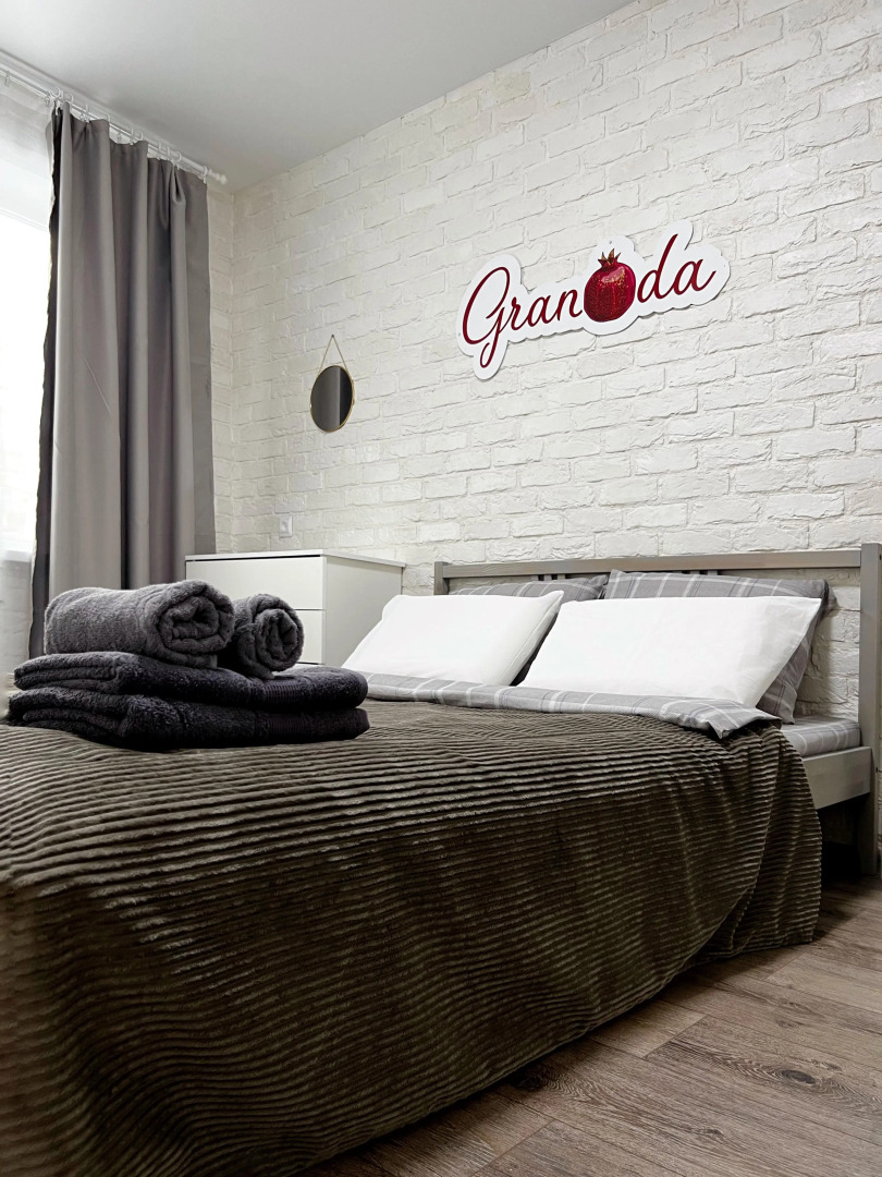 Апартаменты Granada Комфортная Евро-двушка в центре города с новым дизайнерским ремонтом