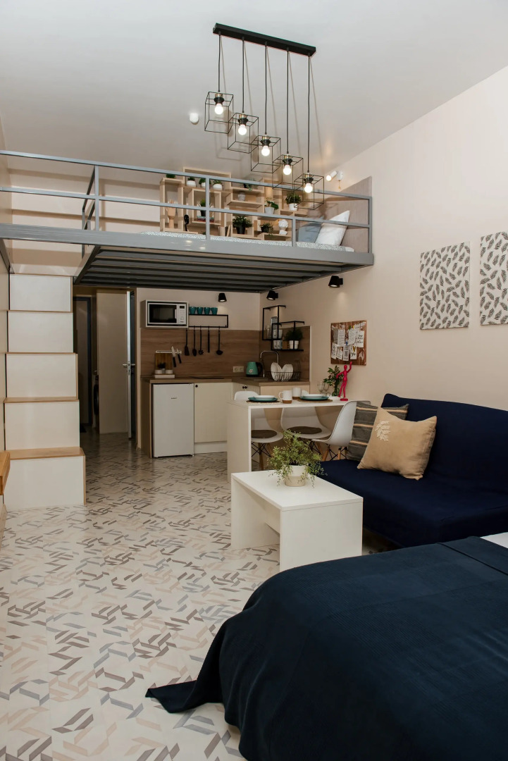 Квартира студия двухуровневая