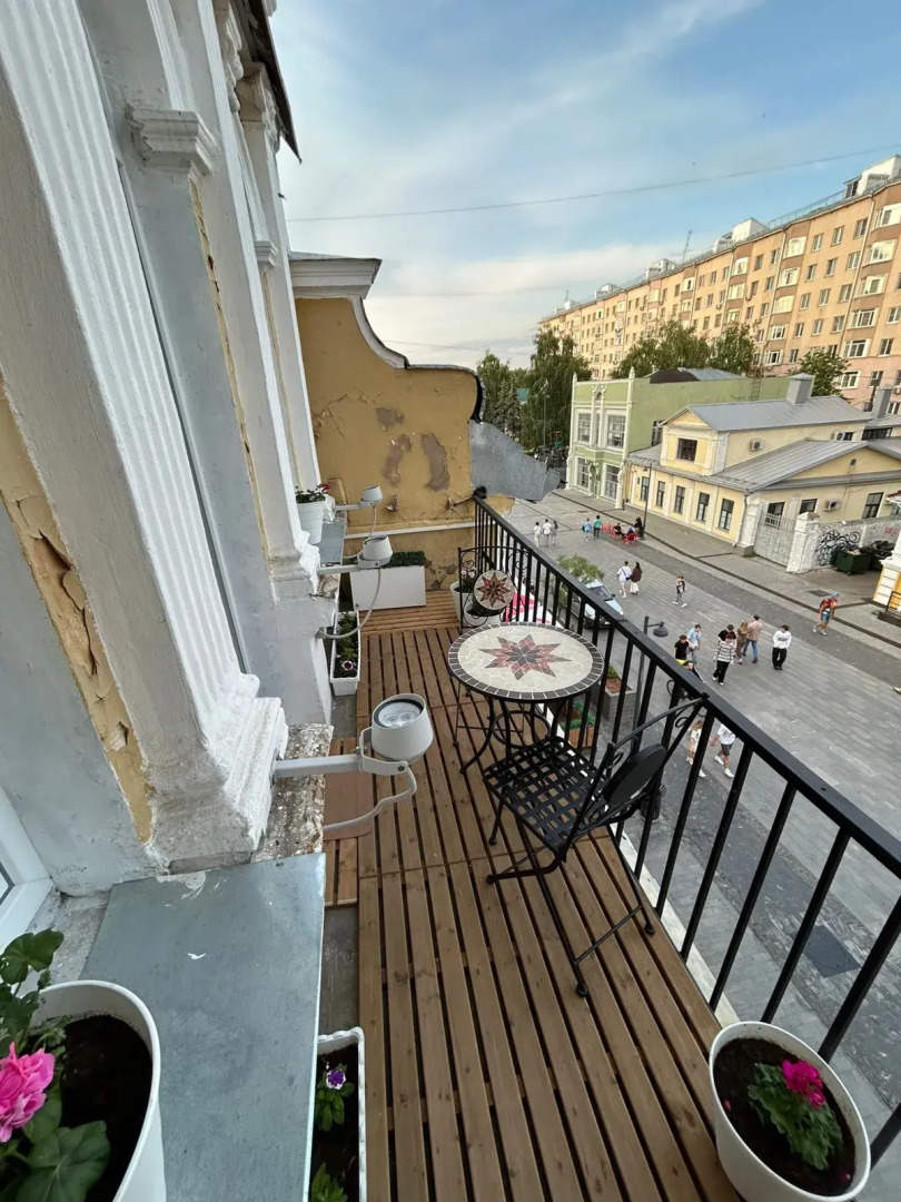 Квартира Уютный Лофт с балконом на главной улице Столицы Закатов