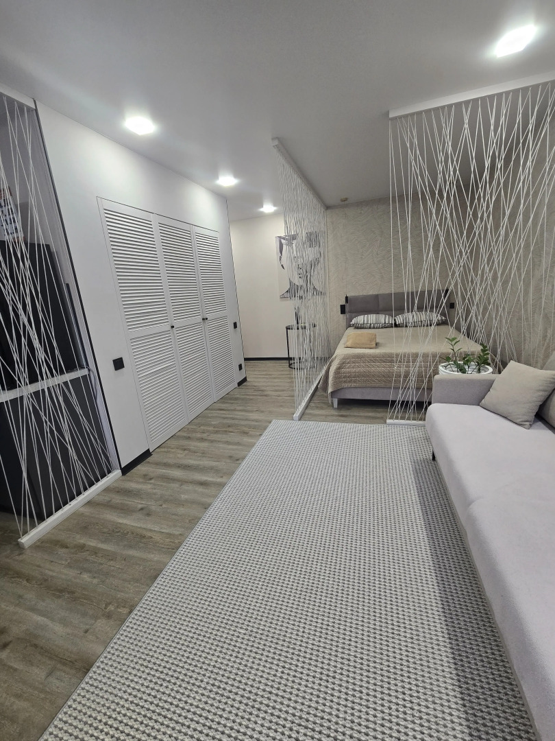 Апартаменты Уютная студия возле Набережной