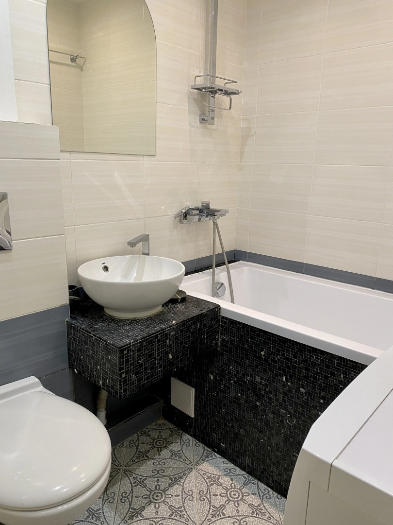 Апартаменты Уютная современная квартира в историческом центре города