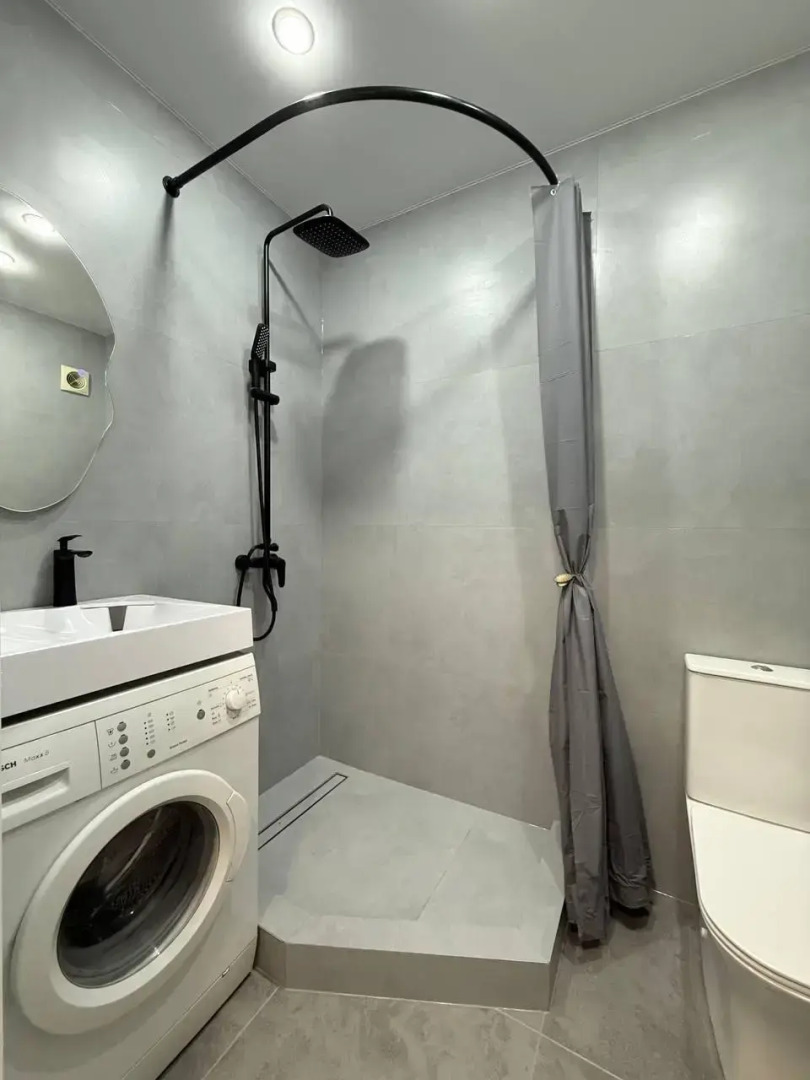 Современная студия в центре Апартаменты