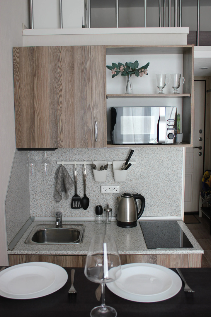 Апартаменты Уютная Двухуровневая Студия в Центре Города