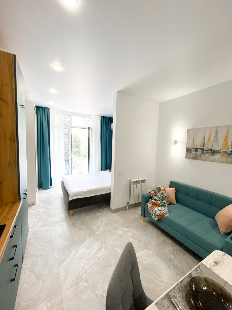 Апартаменты-студия 30 кв.м. с кроватью и балконом, с 3 по 6 этаж