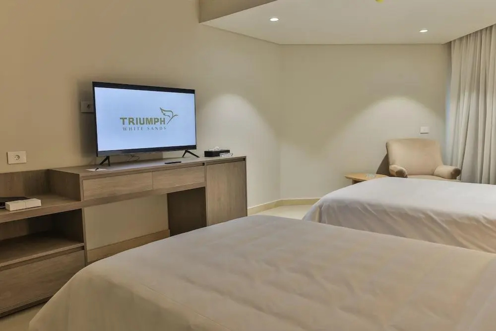 Отель Triumph White Sands