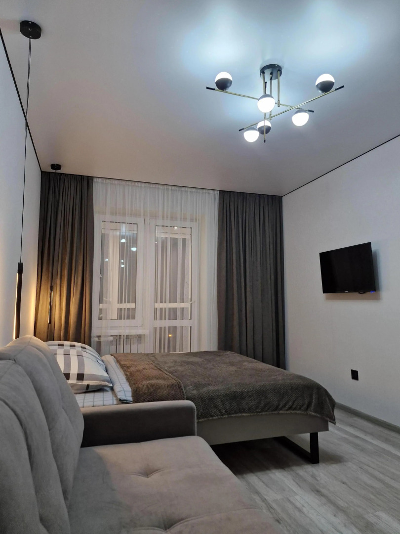 Апартаменты в Центре с Гостинной и 2 Спальнями