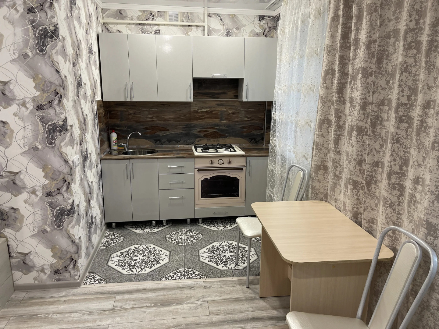 Апартаменты на Проспекте Строителей 27-4