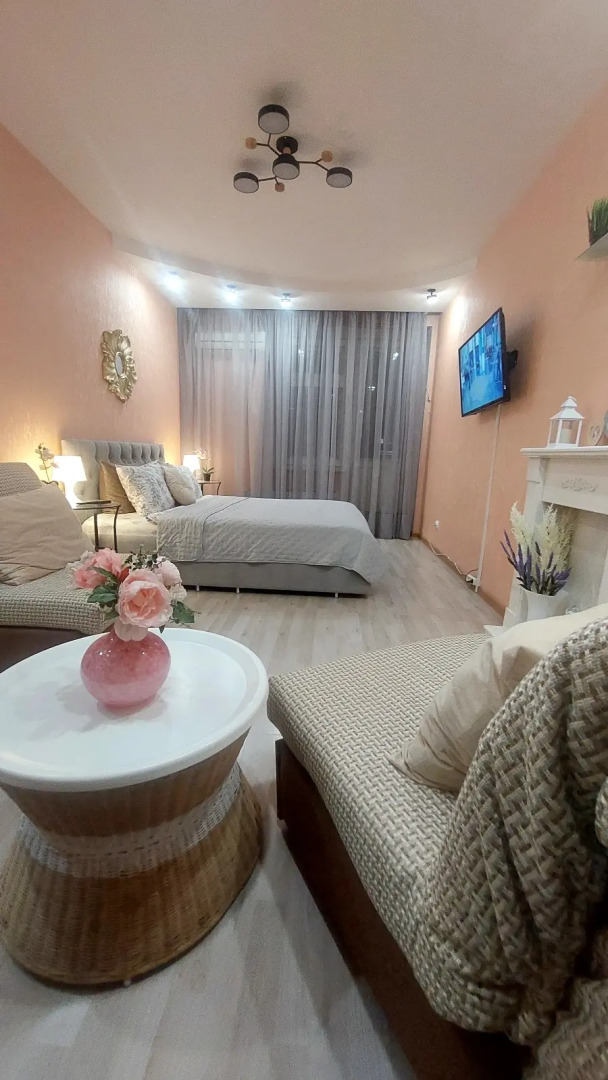 Апартаменты Квартира в центре с качелями на веранде рядом с колесом обозрения