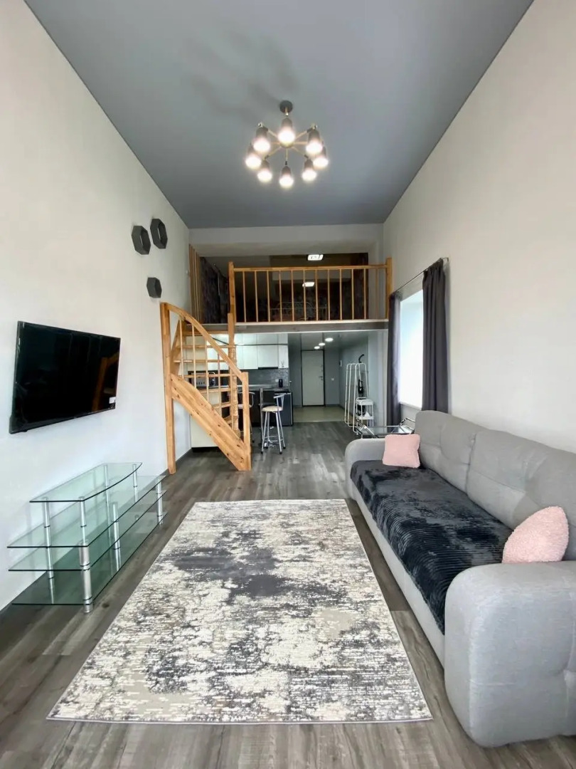 Квартира Просторная студия в центральной части города