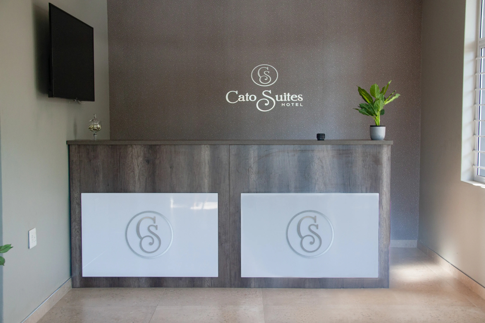 Отель The Cato Suites