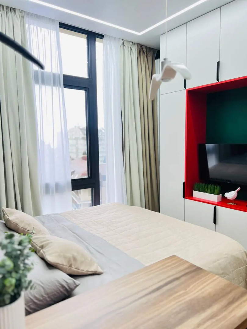 Апартаменты Студия с дизайнерским ремонтом с бассейном на крыше