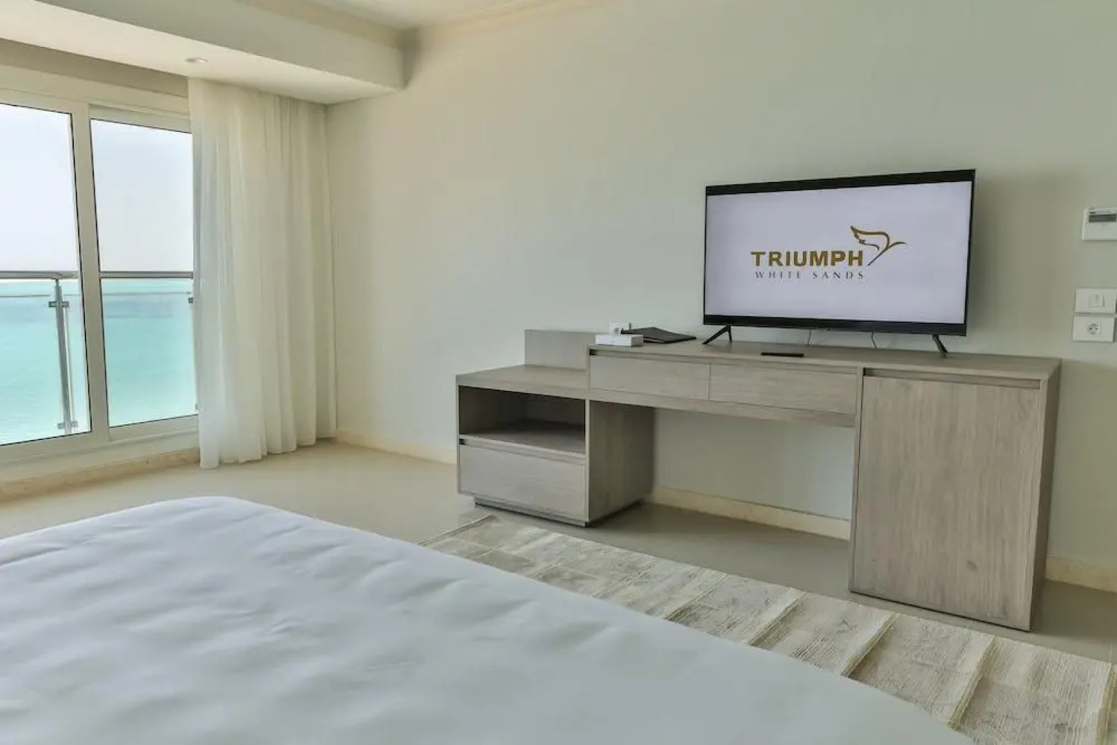 Отель Triumph White Sands