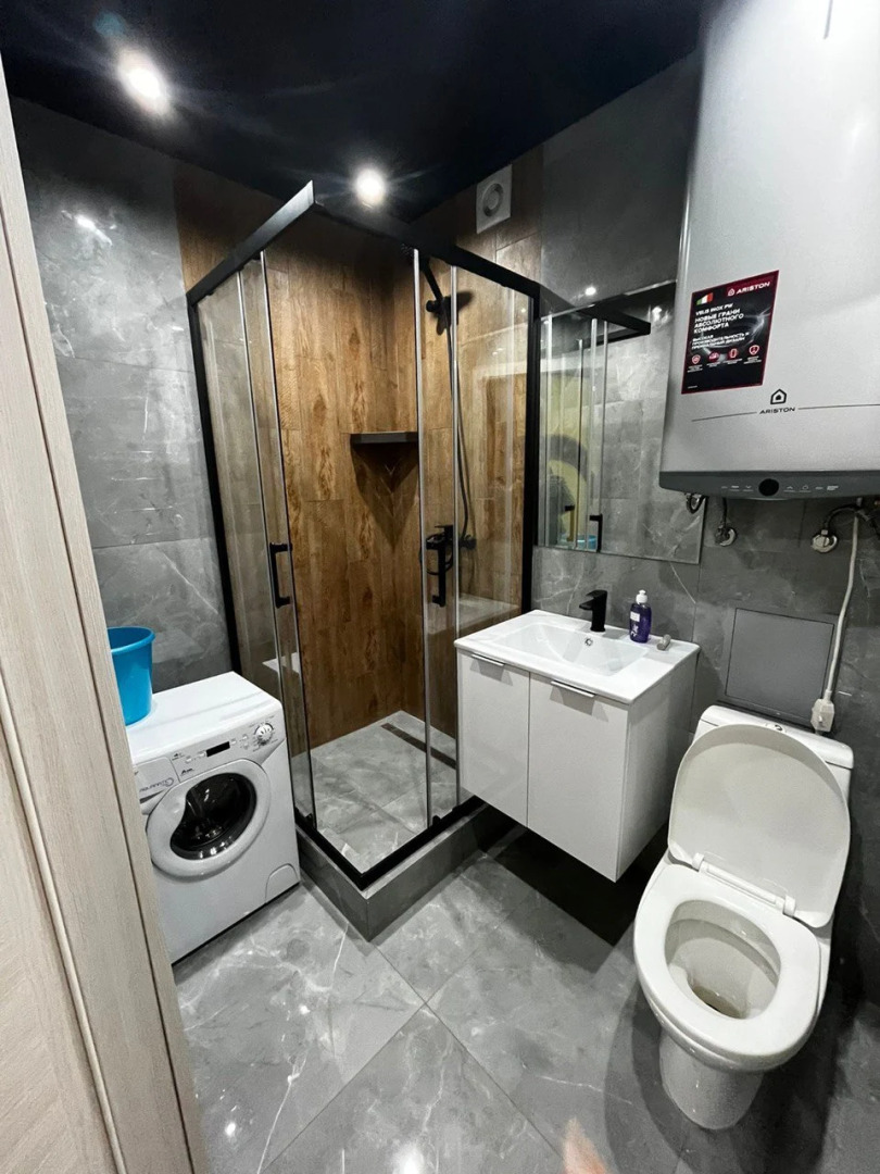 Апартаменты Уютная двухкомнатная квартира в центре