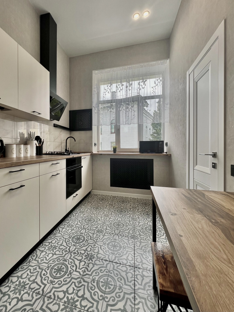 Апартаменты Светлая двухкомнатная квартирка возле ЦУМа