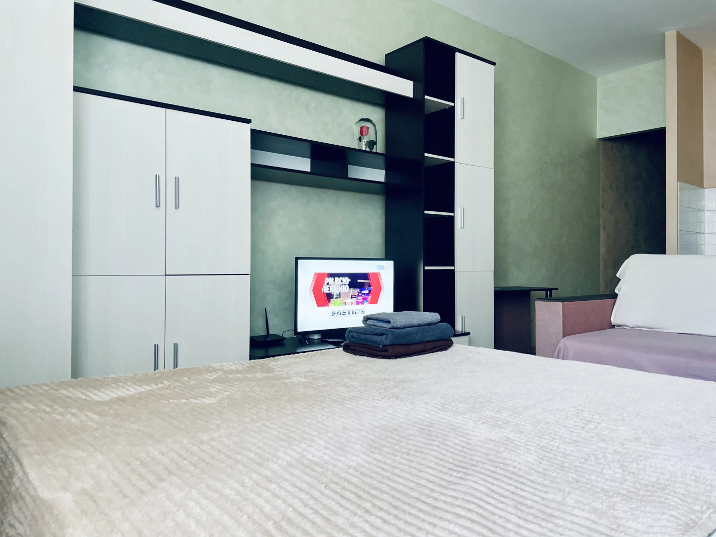 Квартира Уютная студия на Раздольной 1