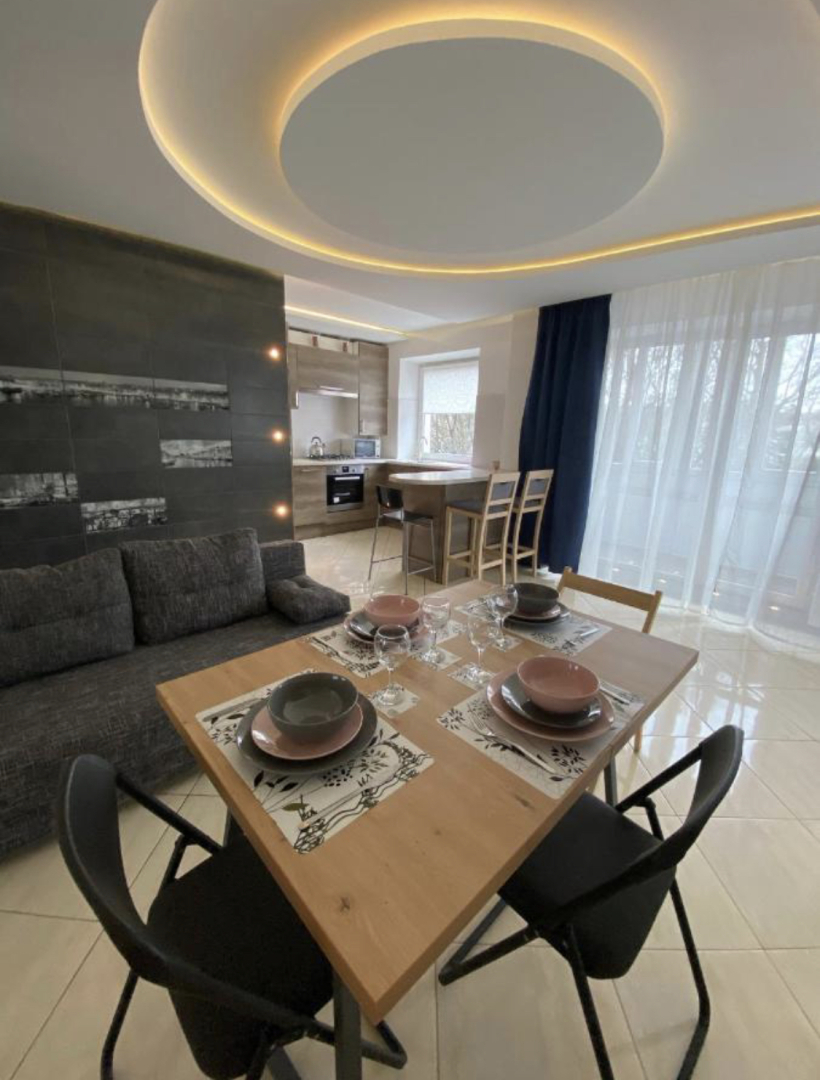 Апартаменты Уютная современная квартира в историческом центре города