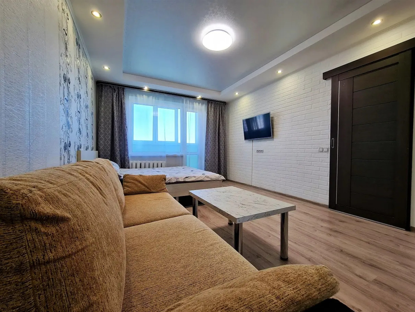 Апартаменты на бульваре Непокоренных 65