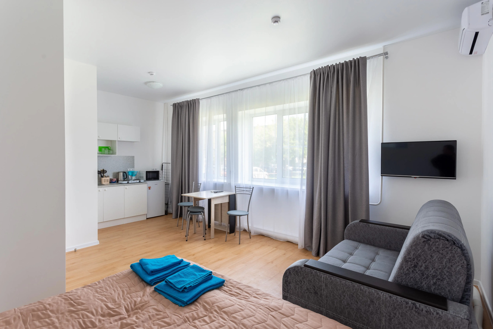 Апартаменты ОK на Буханцева 66