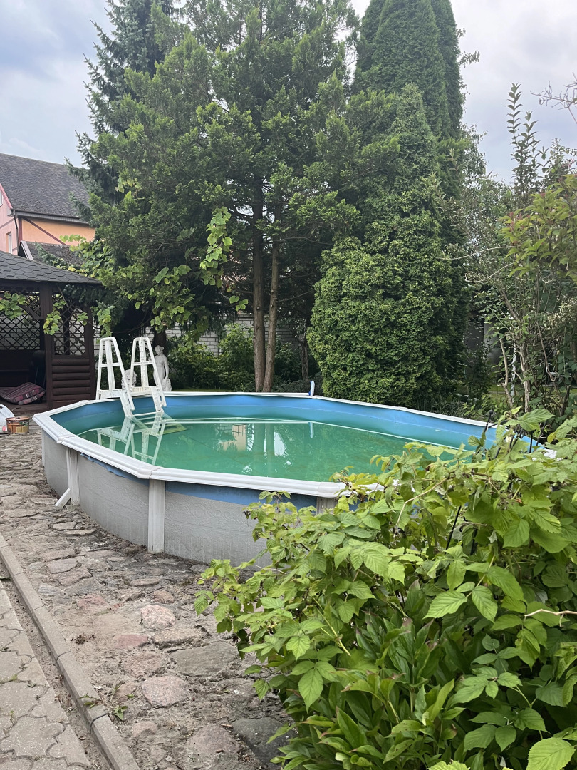 Частный дом с бассейном, сауной и камином