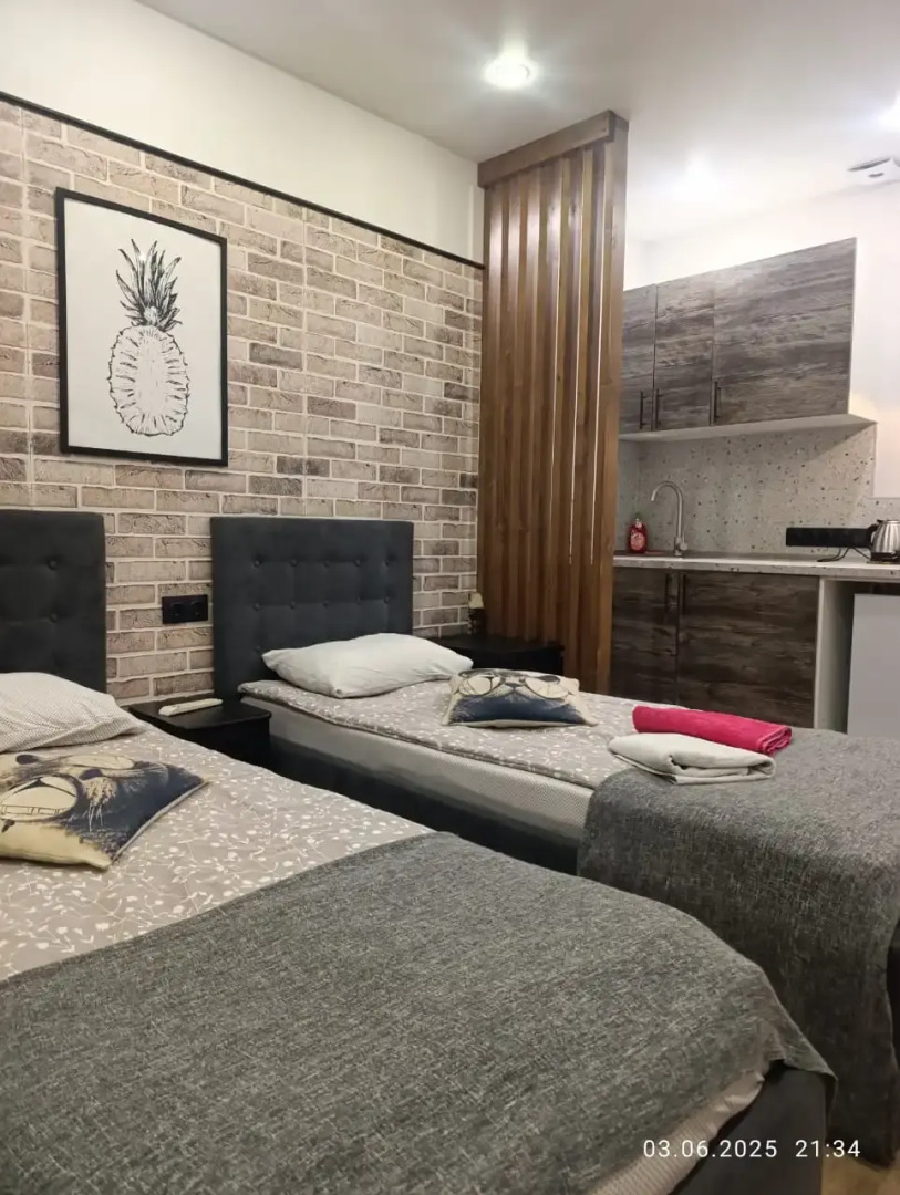 Апартаменты Уютная Студия с Балконом