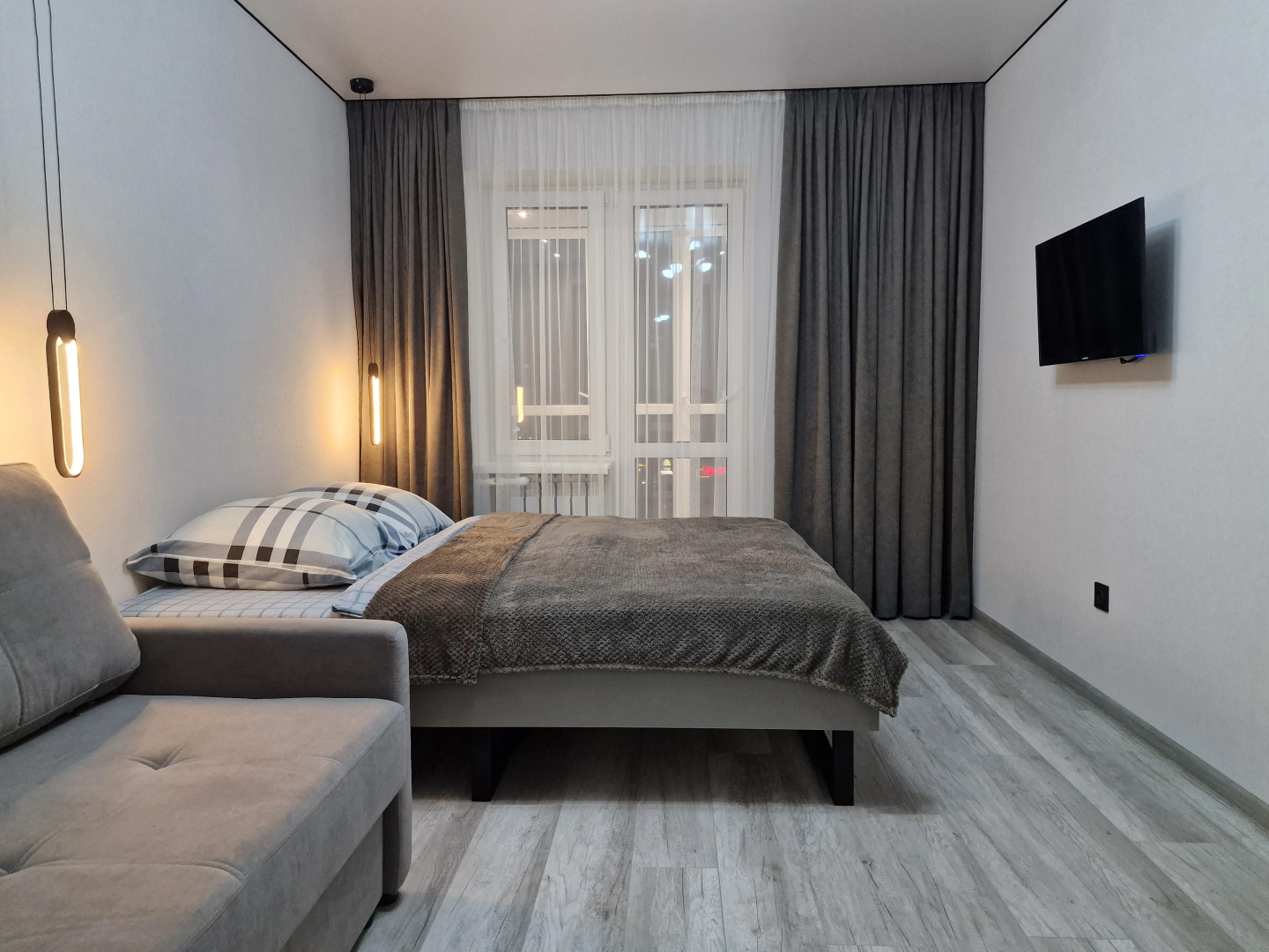 Апартаменты в Центре с Гостинной и 2 Спальнями