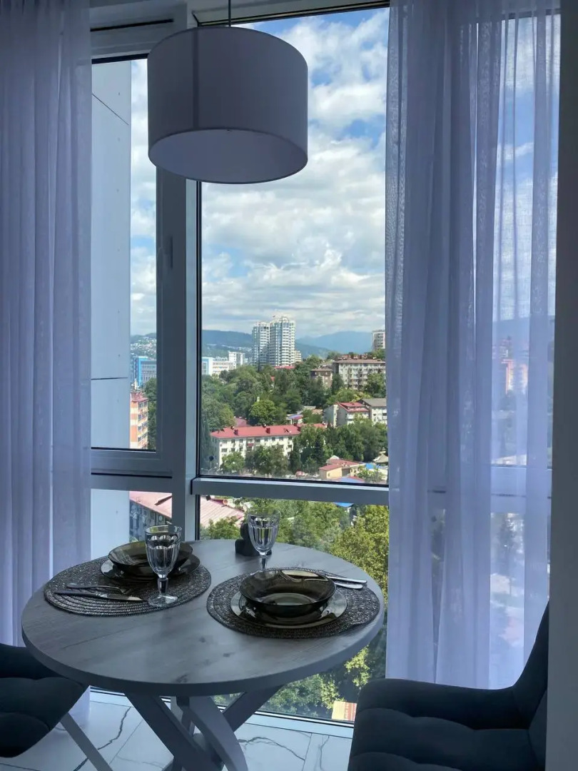 Апартаменты-студия 30 кв.м. с двуспальным диваном и панорамной зоной, 15 этаж