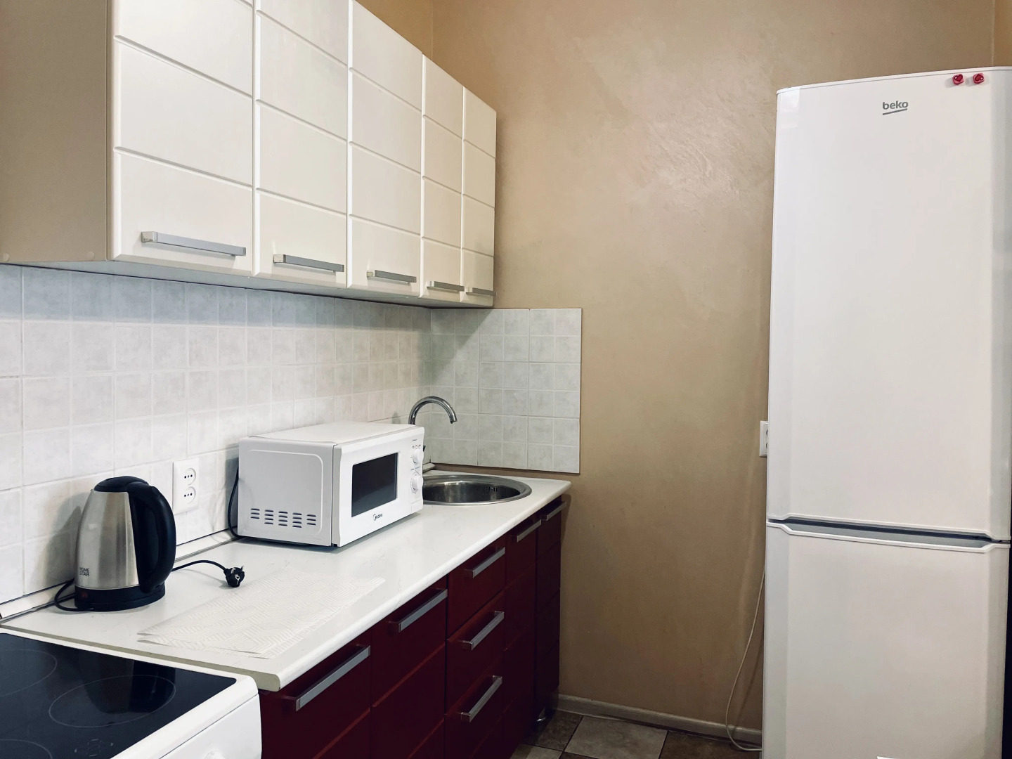 Квартира Уютная студия на Раздольной 1