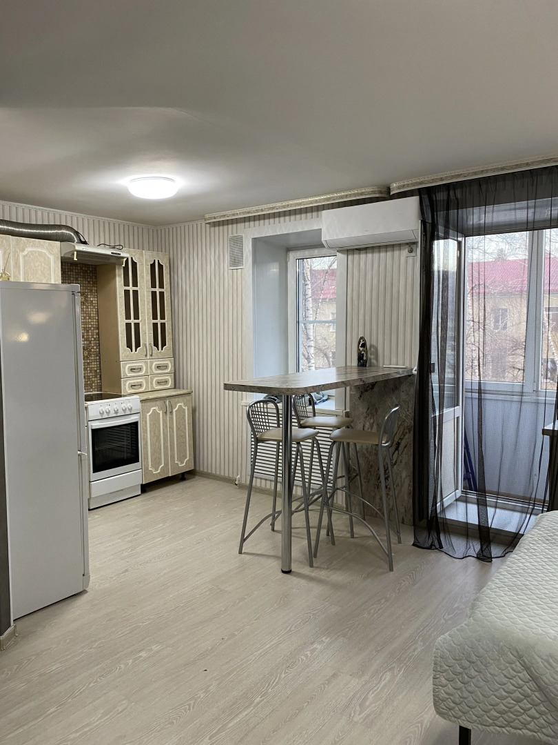 Апартаменты Уютная Студия на Коммунистическом проспекте