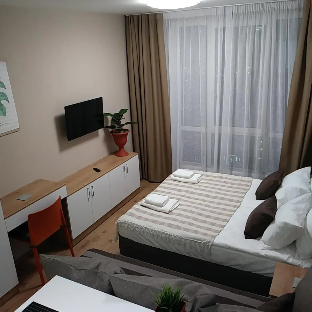 Апартаменты Уютная Студия с панорамным видом на город рядом с метро Парнас