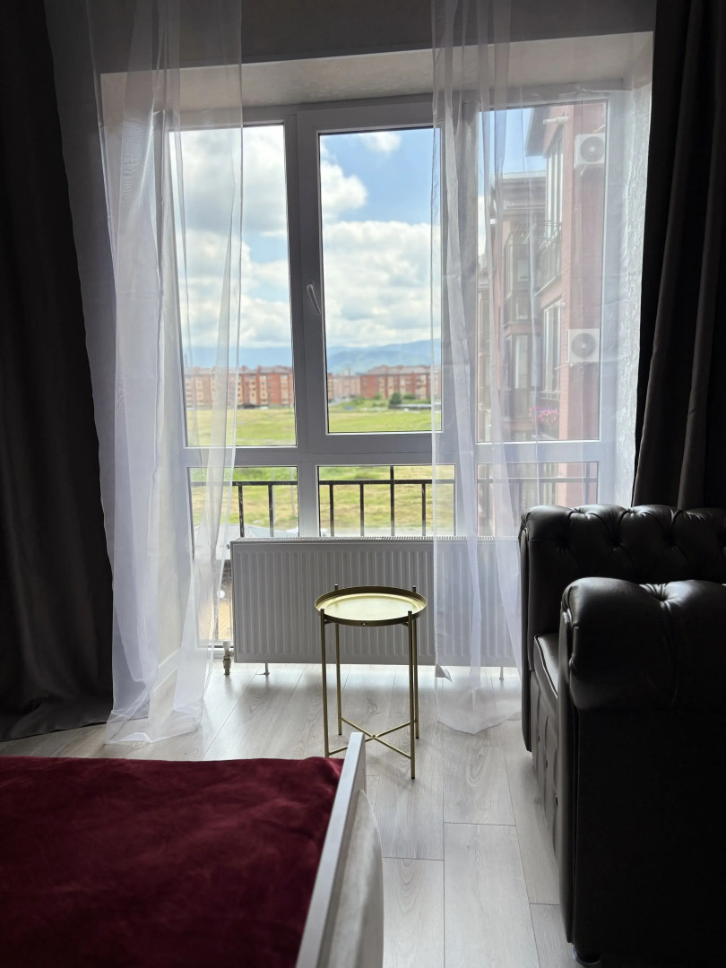 Квартира Стильная Студия с Видом на Горы