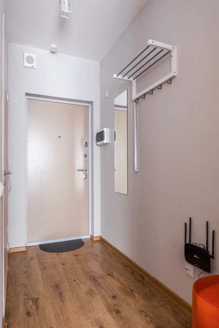 Апартаменты Уютная студия у метро Парнас