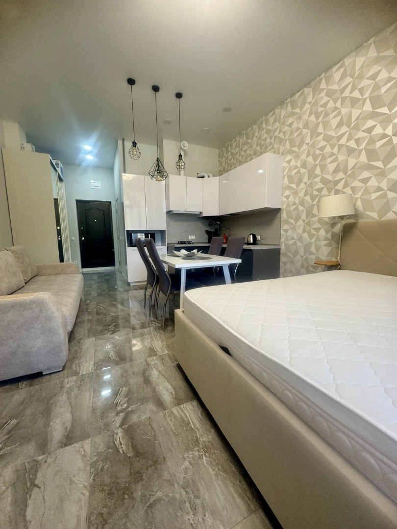 Квартира Просторная студия с террасой напротив отеля Мариотт