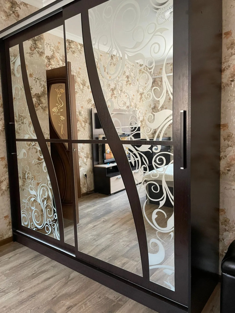 Апартаменты Квартира уютная с спорт площадкой во дворе